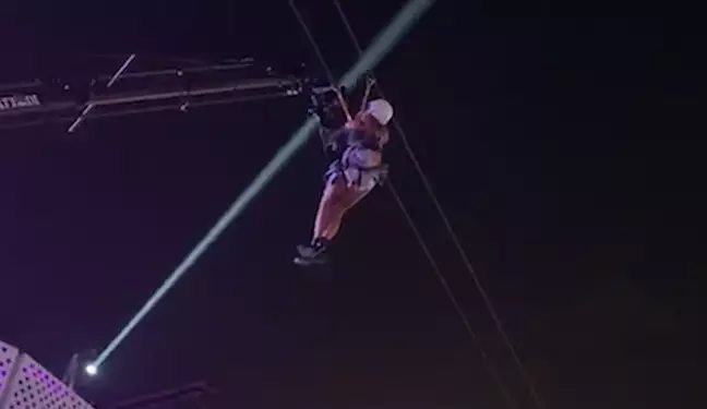 Mulher fica presa em tirolesa do Rock in Rio e resgate viraliza; veja